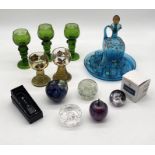 A collection of various art glass including Eastern style coffee set, goblets, paperweights etc