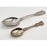 A continental silver (800) serving spoon along with a hallmarked silver dessert spoon, total