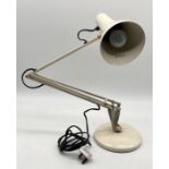 A vintage Anglepoise Lighting Ltd. lamp with embossed stamp to base