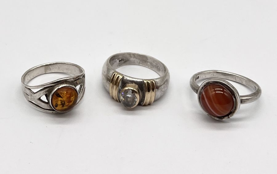 A 925 silver ring (also marked 585) along with two other silver rings