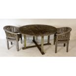 A weathered Cotswold Teak garden table (150cm diameter) and two matching curved chairs