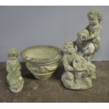 A large reconstituted stone planter plus two water feature, one in the form of classical cherubs,