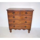 A Victorian mahogany chest of five drawers, raised on turned legs, length 107cm, height 116.5cm.