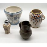 A collection of china and studio pottery jugs, pots etc.
