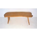 A live edge wooden bench, length 113cm.
