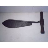 A vintage wooden handled hay knife/ peat cutter
