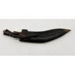 A vintage Kukri with the blade marked "Lai India" in leather scabbard with two smaller skinning