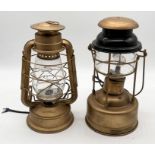 Two painted lanterns including a Tilley Lamp and one other