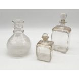 Two antique glass scent bottles with gilt decoration along with an antique etched, ring-necked