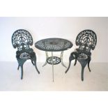 A cast metal bistro garden table and two chairs.