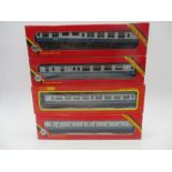 A collection of four boxed Hornby Railways OO gauge Inter-City carriages including the Buffet Coach,