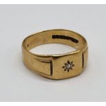 A 9ct gold gentleman's ring set with a small diamond, weight 5g