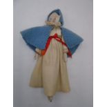 An 19th Century wooden peg doll