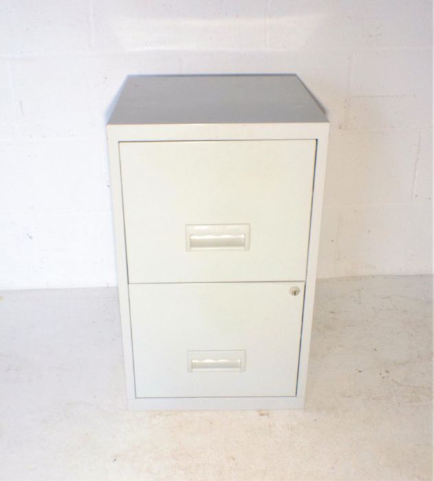 A metal two drawer filing cabinet.