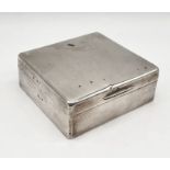 A small hallmarked silver cigarette box, 8cm x 8.5cm