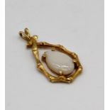 A small 14ct gold (tested) pendant set with an opal, weight 1.2g