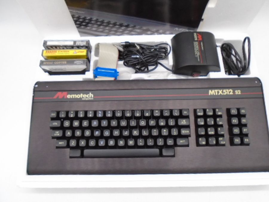 A boxed Memotech MTX512 S2 computer with power supply, memory and other accessories, along with a - Image 2 of 11