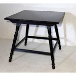 A Victorian ebonised table on turned legs made by C. Hindley & Sons, Oxford St. London stamped to