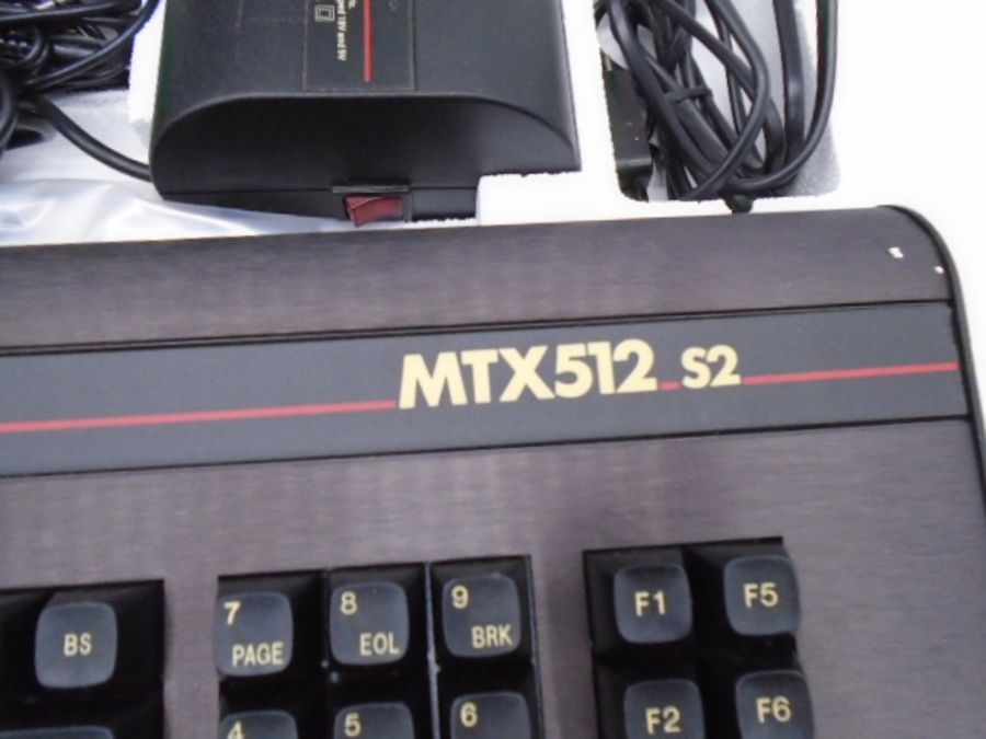 A boxed Memotech MTX512 S2 computer with power supply, memory and other accessories, along with a - Image 4 of 11