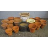 A selection of mostly terracotta pots, also includes glazed pots.