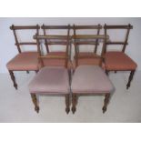 A set of six Victorian upholstered dining chairs, two with mismatched upholstery.