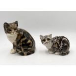 Two Winstanley tabby cats both signed to base