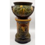 A Bretby majolica jardinière and stand with floral pattern numbered 509 K to base - height 68cm