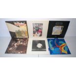 Six 12" vinyl records comprising of four Led Zeppelin albums and two Robert Plant albums.