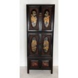 A Japanese 19th Century lacquered cabinet with hand painted decoration to doors