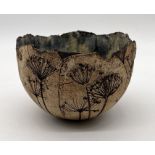 A Gillian Acreman studio pottery bowl with dandelion motif and impressed mark to rim - diameter 17cm