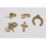 Five 9ct gold charms, total weight 3.6g