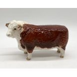 A Beswick Hereford Bull stamped to the base and marked "Ch. of Champions"