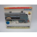A boxed Hornby OO gauge Kentish Belle limited edition train pack (R2079) comprising of Schools class