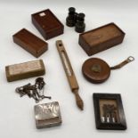 An assortment of items including vintage wooden games boxes, opera glasses, keys, Gidu sewing tool