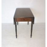 A Georgian mahogany Pembroke table with single drawer and faux drawer, raised on turned legs.