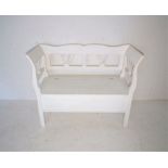 A painted white bench with lift up seat revealing storage under, length 116cm, height 93cm.
