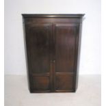 A Georgian mahogany corner cupboard.