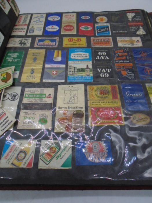 A large collection of vintage matchbox covers, an album and a box of loose. - Image 12 of 46