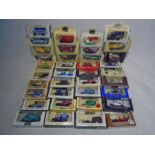 A collection of boxed die-cast vehicles including Lledo Days Gone, Matchbox Models of Yesteryear,