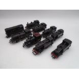 A collection of eight OO gauge model railway black tank locomotives including Bachmann, Hornby,