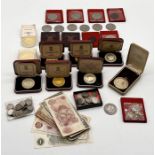 A collection of various UK and other coinage and banknotes including a number of cased Pobjoy Mint