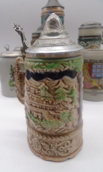 A collection of twelve Steins. - Image 11 of 21