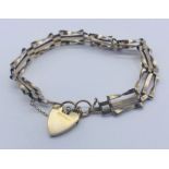 A 9ct gold gate bracelet, weight 7.1g