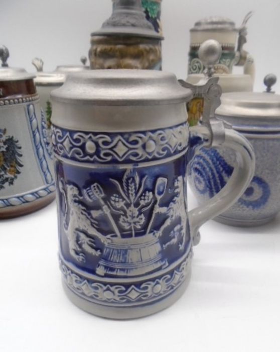 A collection of twelve Steins. - Image 6 of 21