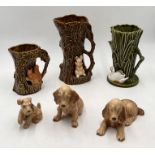 A collection of Sylvac including three jugs, spaniels etc.