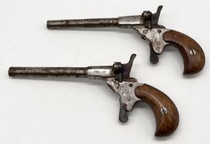 A near pair of blank firing cyclist's dog-scaring Pistol's one marked "Fritum" and one "Foreign"