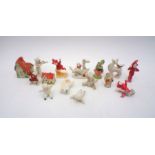 A quantity of antique Christmas cake decorations, including snow babies.