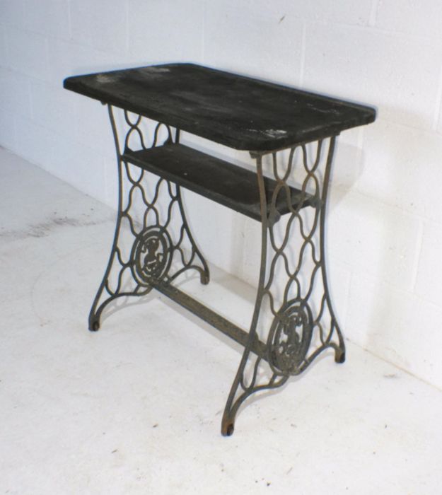 A garden table converted from a Singer sewing machine base with wooden top. - Image 2 of 4