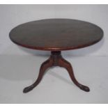 A Georgian mahogany tip up table.