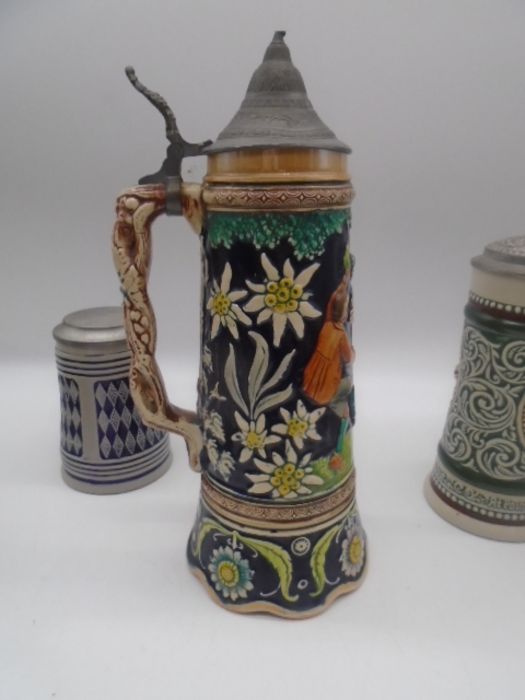 A collection of twelve Steins. - Image 20 of 21